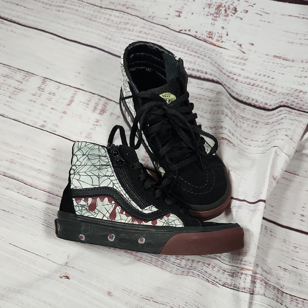 Vans Black and White High-Tops with Red Accents